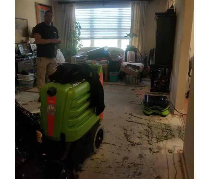 Water damage remediation equipment in a home