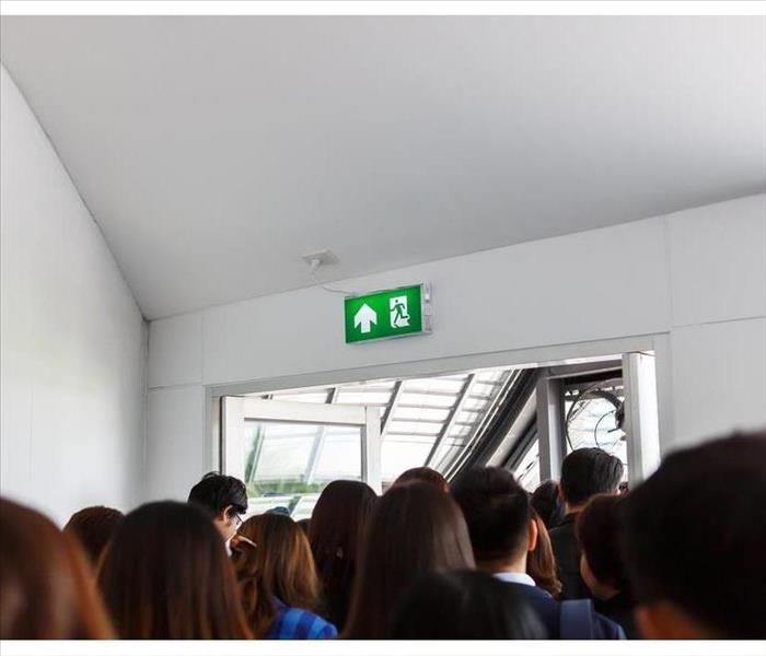 People escape to exit door